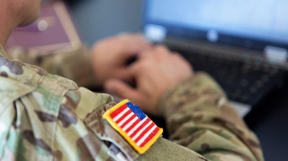 Closeup of the flag on the shoulder of an American soldier